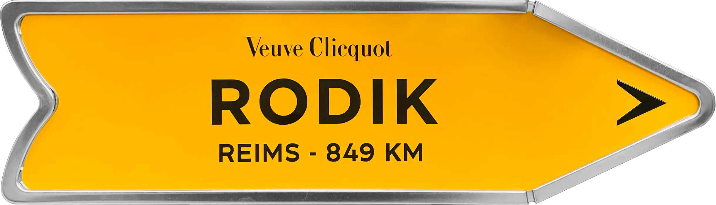 Yellow road sign: Veuve Clicquot — Rodik, Reims 849 km